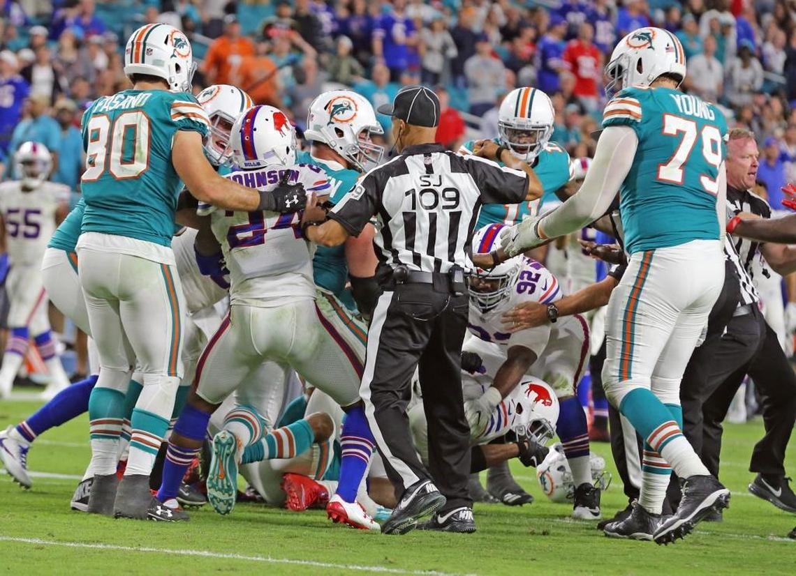 Miami Dolphins and Buffalo Bills players get into a fight on the field late in the fourth quarter at Hard Rock Stadium on Sunday, Dec. 31, 2017.
