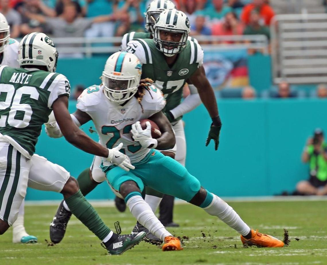Miami Dolphins Jay Ajayi in the first quarter as they play the New York Jets Sunday, Oct. 22, 2017, at Hard Rock Stadium in Miami Gardens, Fla.