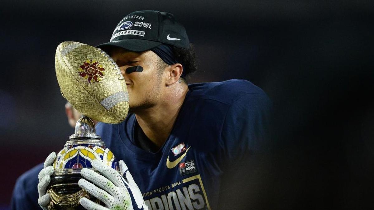 Penn State safety Marcus Allen kisses the Fiesta Bowl trophy after defeating the Washington Huskies 35-28 in late December.