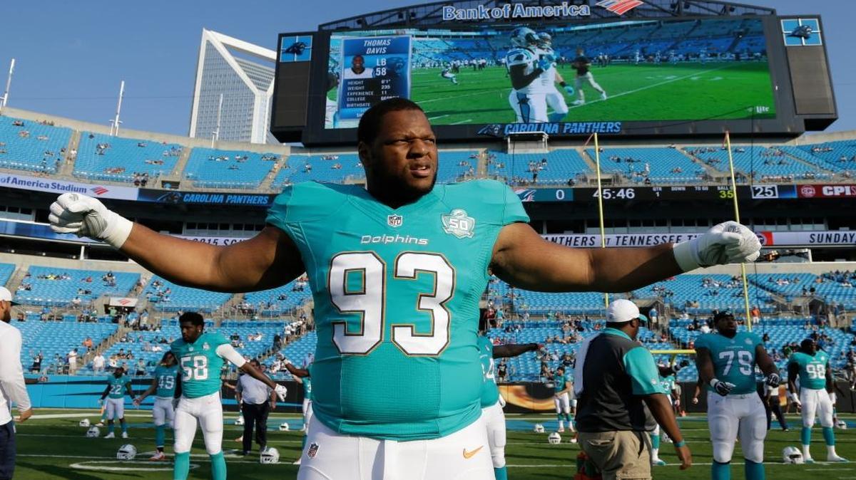 
Miami Dolphins' Ndamukong Suh (93) warms up before an NFL preseason football game between the Carolina Panthers and the Miami Dolphins in Charlotte, N.C., Saturday, Aug. 22, 2015.
