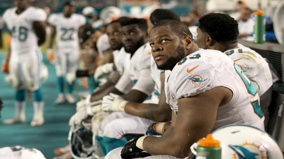 
Miami Dolphins defensive tackle Ndamukong Suh (93) on the bench late in the fourth quarter as Miami loses 41-14. The Miami Dolphins host the Buffalo Bills in the home opener at Sun Life Stadium in Miami Gardens on Sunday, September 27, 2015.
