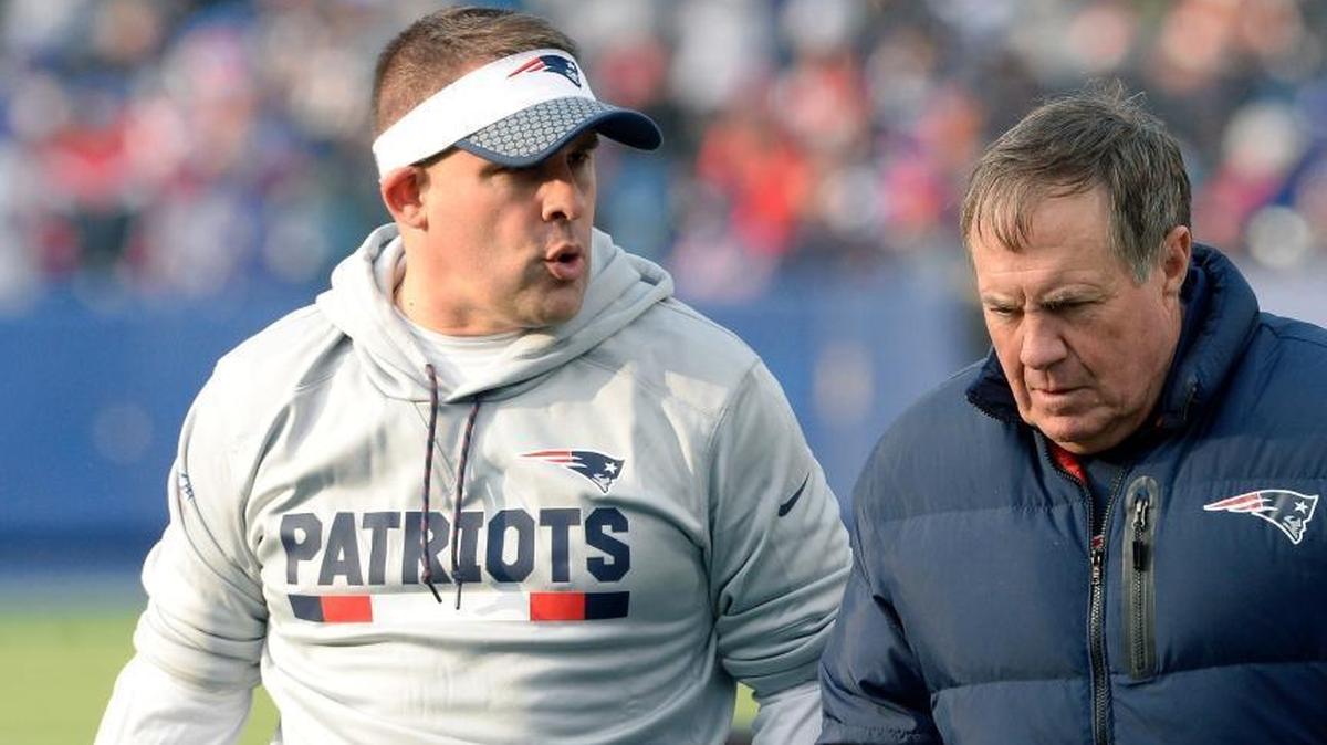 New England Patriots offensive coordinator Josh McDaniels, left, talks to head coach Bill Belichick during a game against the Buffalo Bills on Sunday, Dec. 3, 2017, in Orchard Park, New York. The Patriots beat the Bills 23-3.