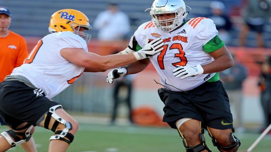 North Squad offensive tackles Tyrell Crosby of Oregon (73) and Brian O’Neill of Pittsburgh run drills during the North team’s practice ahead of January’s Senior Bowl.