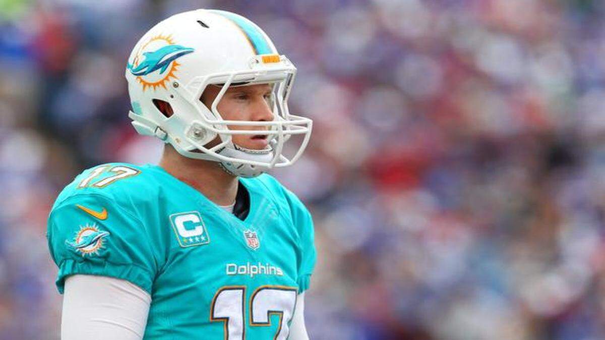 
Miami Dolphins quarterback Ryan Tannehill (17) walks to the sidelines during the first half of an NFL football game against the Buffalo Bills on Sunday, Sept. 14, 2014, in Orchard Park, N.Y. 
