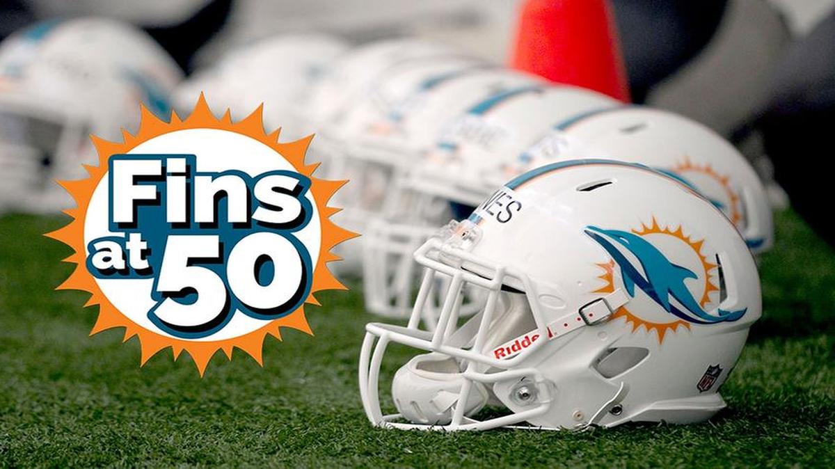 
Helmets with the latest Miami Dolphins logo await rookies and free agents for the first day of rookie camp at Nova Southeastern University on May 3, 2013.
