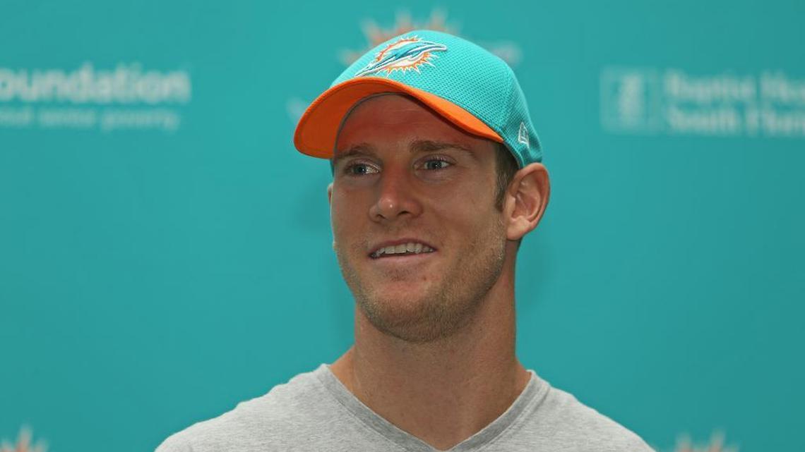 Miami Dolphins quarterback Ryan Tannehill #talks to the media last week.  Dolphins players are impressed with what they've seen from Tannehill off knee surgery.