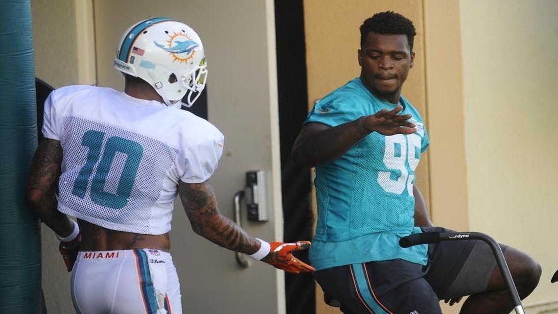 Dion Jordan, shown riding the exercise bike in training camp, is set to practice for the first time in nearly two years.