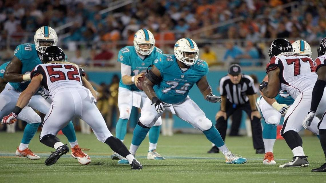 Jermon Bushrod (74) was never a guard before this year. So he never had to be the link between the quarterback and center. He earned passing grades in both in his Dolphins debut, but Miami’s line must play better.