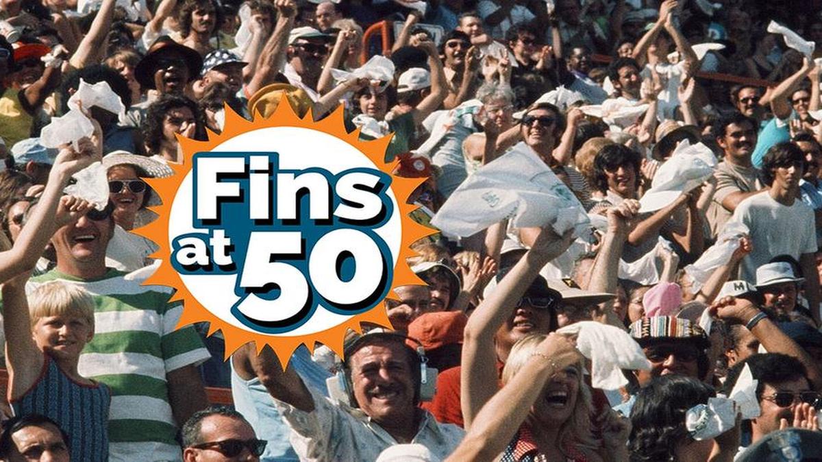 
Dolfans celebrate by waving white handkerchiefs at the request of play-by-play announcer Rick Weaver.

