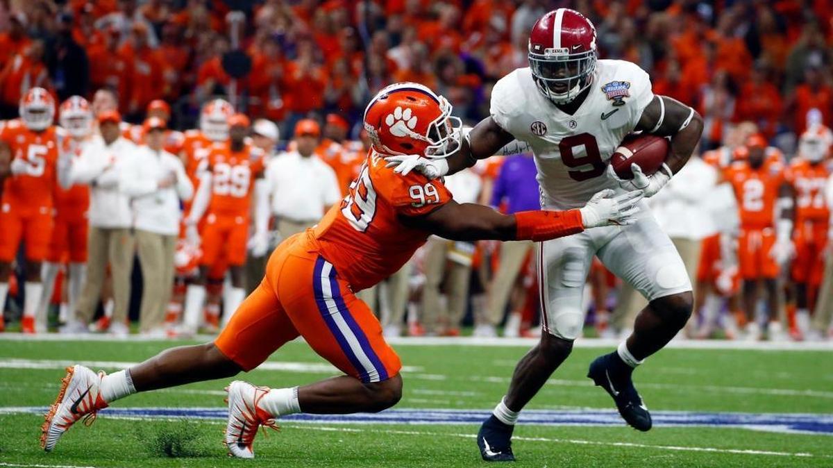 One of many things Bo Scarbrough, shown carrying the ball, and Kenyan Drake have in common: wins in big games against Clemson.