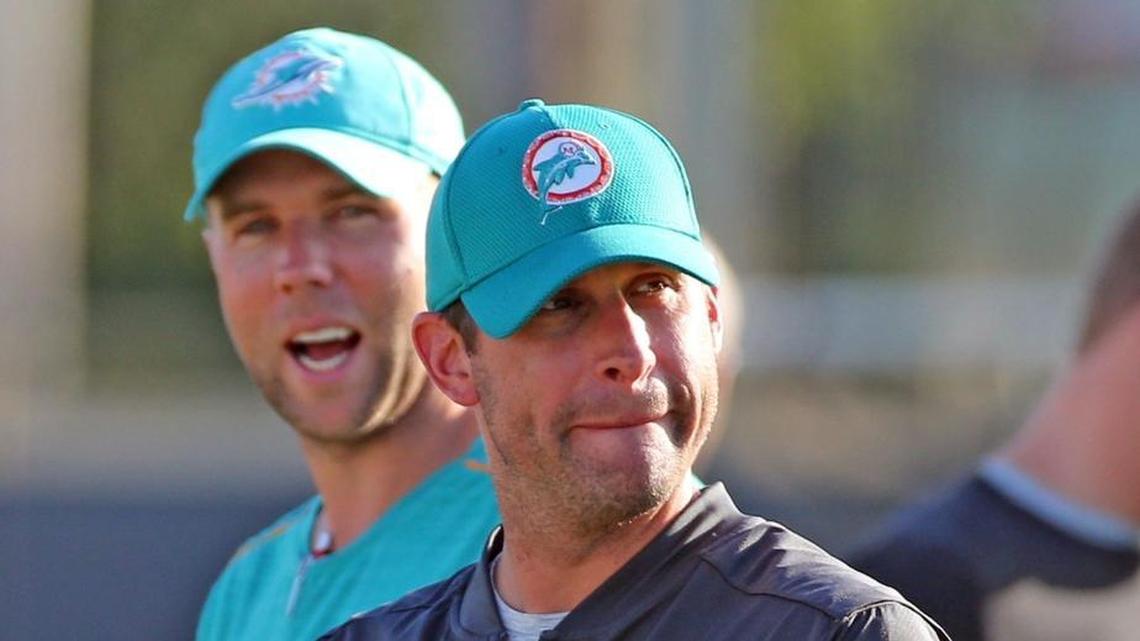 Miami Dolphins coach Adam Gase with quarterback coach Bo Hardegree at the Miami Dolphins training facility Aug. 14, 2017, in Davie.