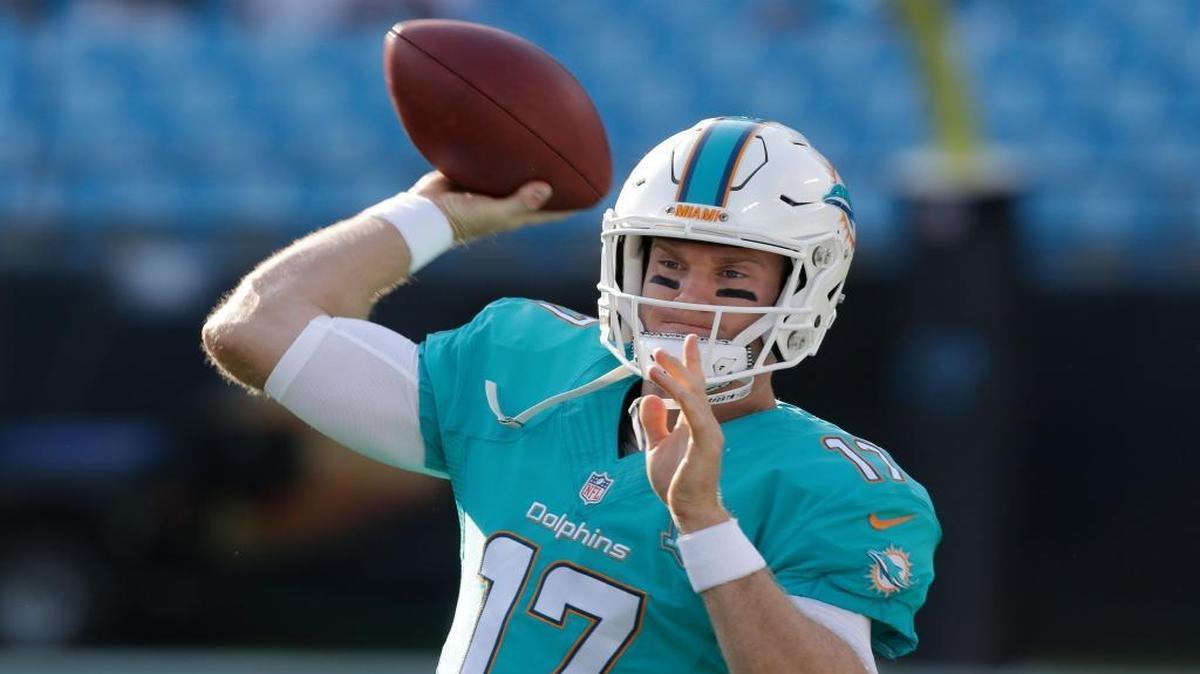 
Miami Dolphins' Ryan Tannehill (17) warms up before an NFL preseason football game between the Carolina Panthers and the Miami Dolphins in Charlotte, N.C., Saturday, Aug. 22, 2015. 
