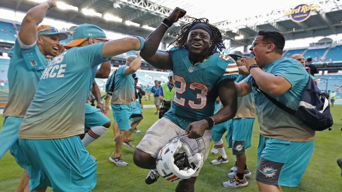 Miami Dolphins running back Jay Ajayi (23) celebrates as the Miami Dolphins host the Buffalo Bills at Hard Rock Stadium on Sunday, October 23, 2016.