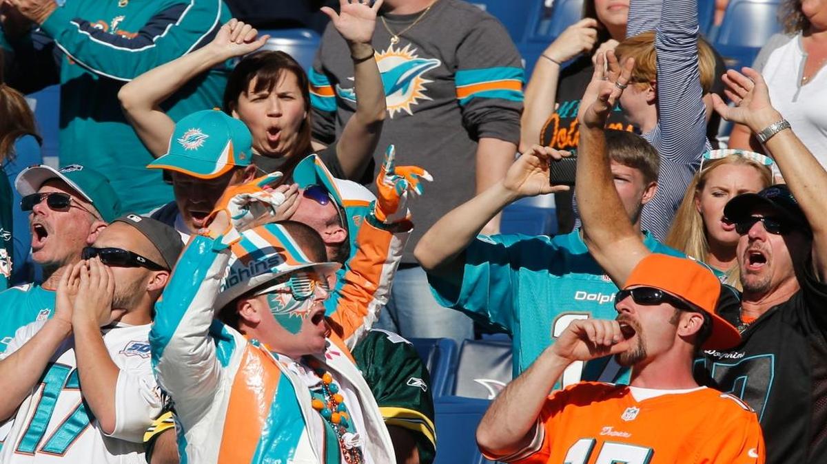 Miami Dolphins fans celebrate as they defeat the Tennessee Titans at Nissan Stadium in Nashville, Tenn, October 18, 2015.