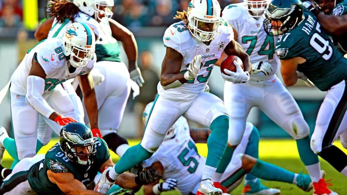 Jay Ajayi runs against the Eagles in a game last season.