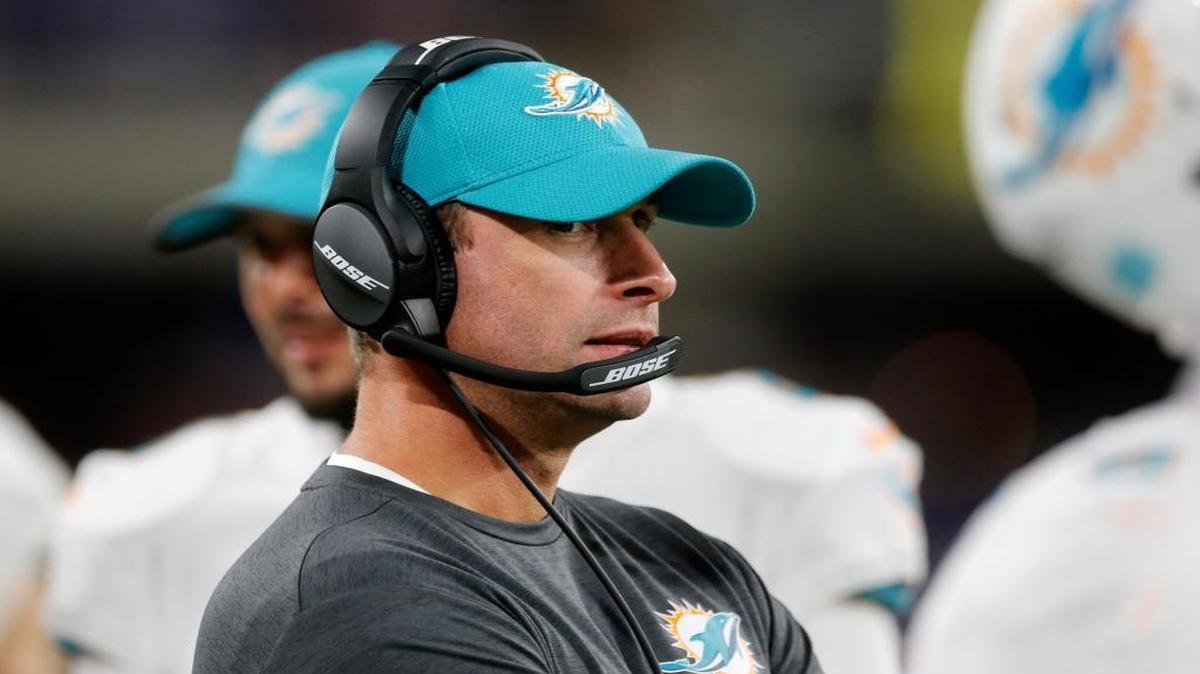 Miami Dolphins head coach Adam Gase watches from the sidelines during the second half of an NFL preseason football game against the Minnesota Vikings.