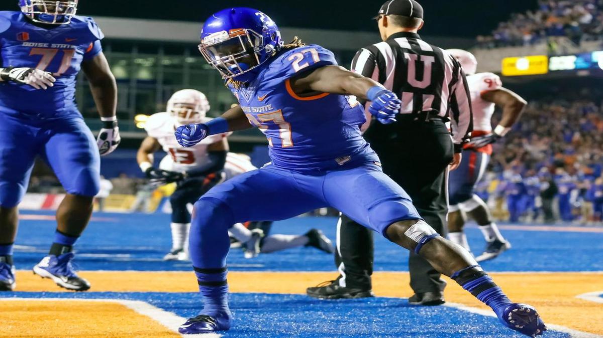 
Boise State running back Jay Ajayi (27) celebrates after his touchdown during the first half of the Mountain West Conference championship NCAA college football game against Fresno State in Boise, Idaho, on Dec. 6, 2014.
