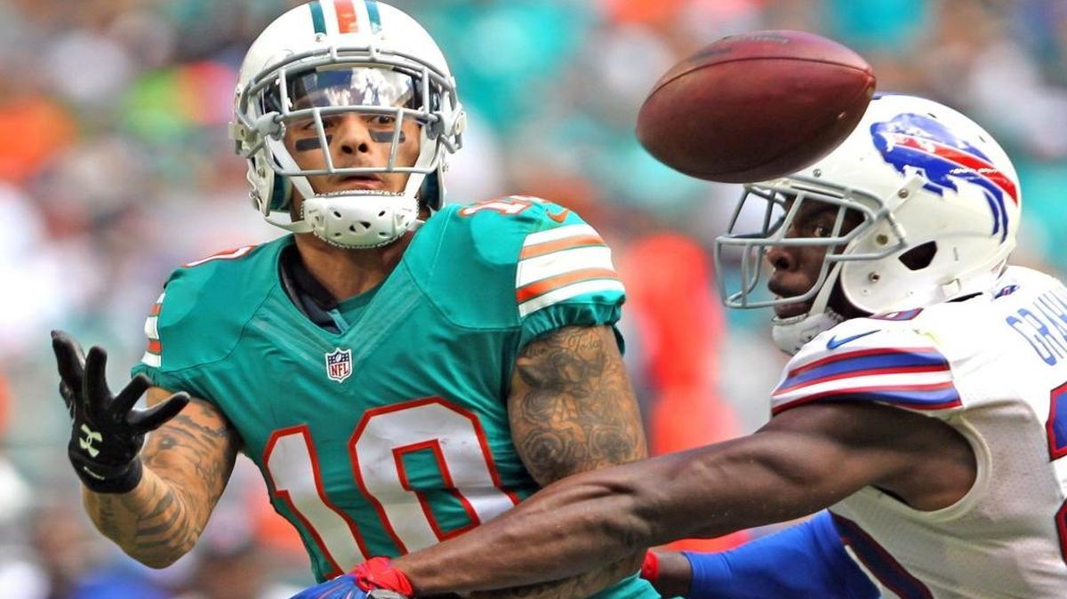 Miami Dolphins Kenny Stills fails to catch a ball as Buffalo Bills Corey Graham defends in the third quarter at Hard Rock Stadium in Miami Gardens, Florida, Oct. 23, 2016.