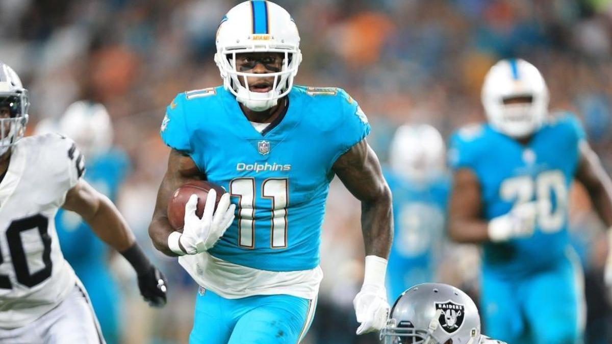 Miami Dolphins wide receiver DeVante Parker (11) runs after a reception in the second quarter as the Miami Dolphins host the Oakland Raiders at Hard Rock Stadium on Sun., Nov. 5, 2017.