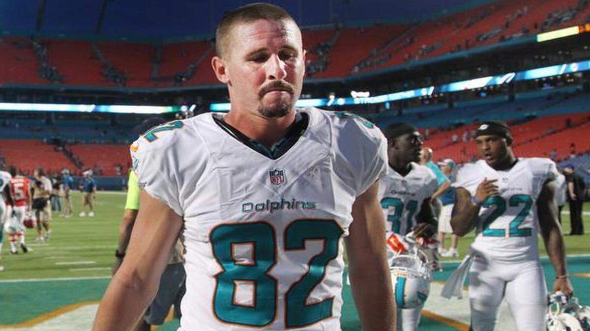 
Brian Hartline leaves the field after the Miami Dolphins lost to the the Kansas City Chiefs at Sun Life Stadium in Miami Gardens, Florida, on Sept. 21, 2014.
