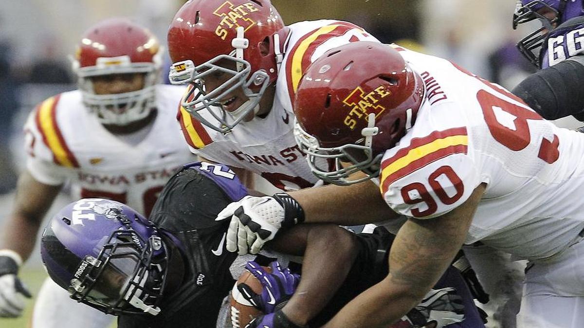 Cleyon Laing (90) is shown making a tackle while he was playing at Iowa State in 2012. Laing, who is trying to earn a spot on the Dolphins’ roster, had 15 sacks in 35 CFL games.