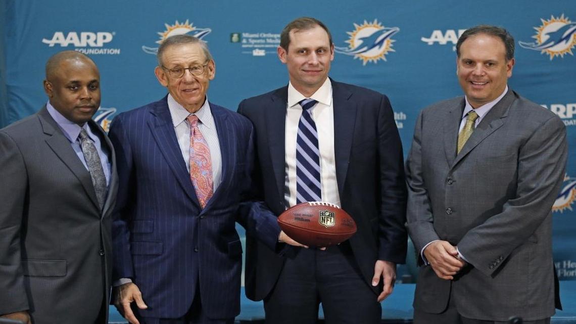 Miami Dolphins general manager Chris Grier, owner Stephen Ross, new head coach Adam Gase and Mike Tannenbaum vice president of football operations, pose on Saturday, January 9, 2016 in Davie.
