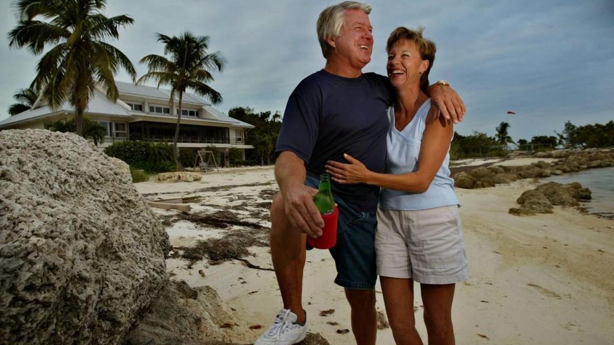 Former Miami Dolphins and University of Miami coach Jimmy Johnson at his beach front home on Islamorada Key with his wife Rhonda Johnson as pictured in 2002.
