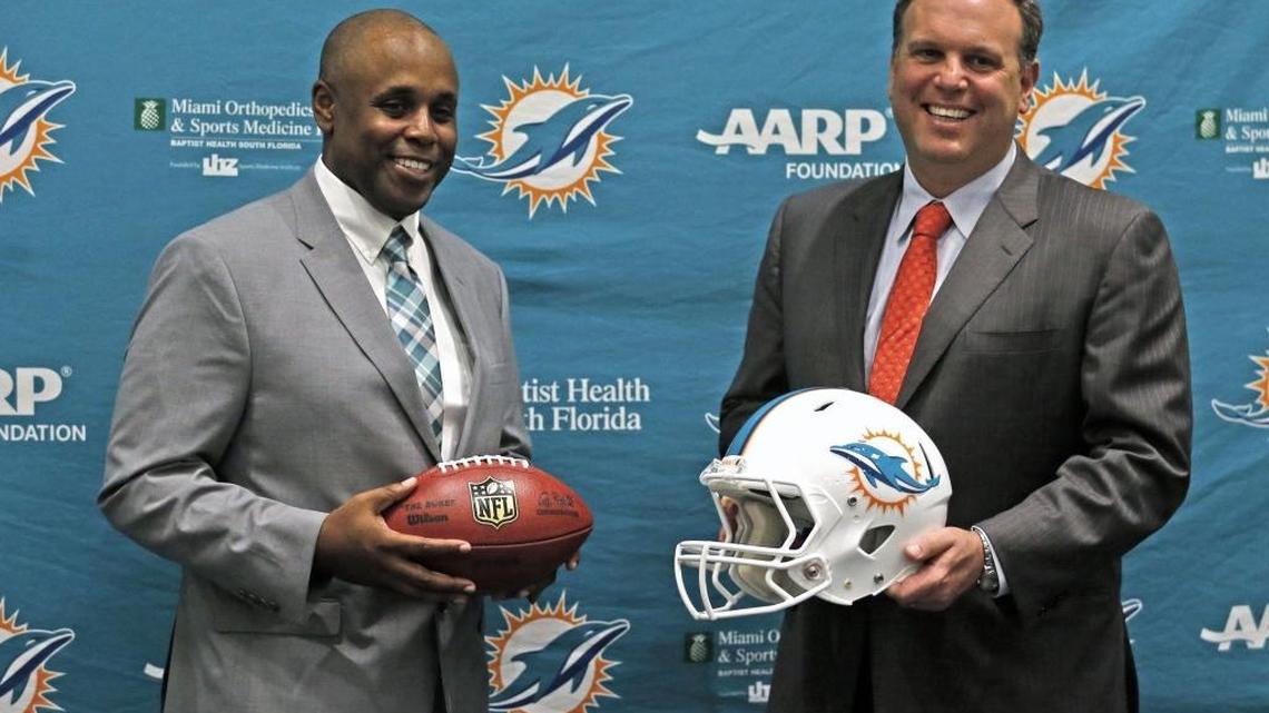General manager Chris Grier, left, and Mike Tannenbaum, executive vice president of football operations, were among the Miami Dolphins officials who watched the University of Miami’s Pro Day on Wednesday.