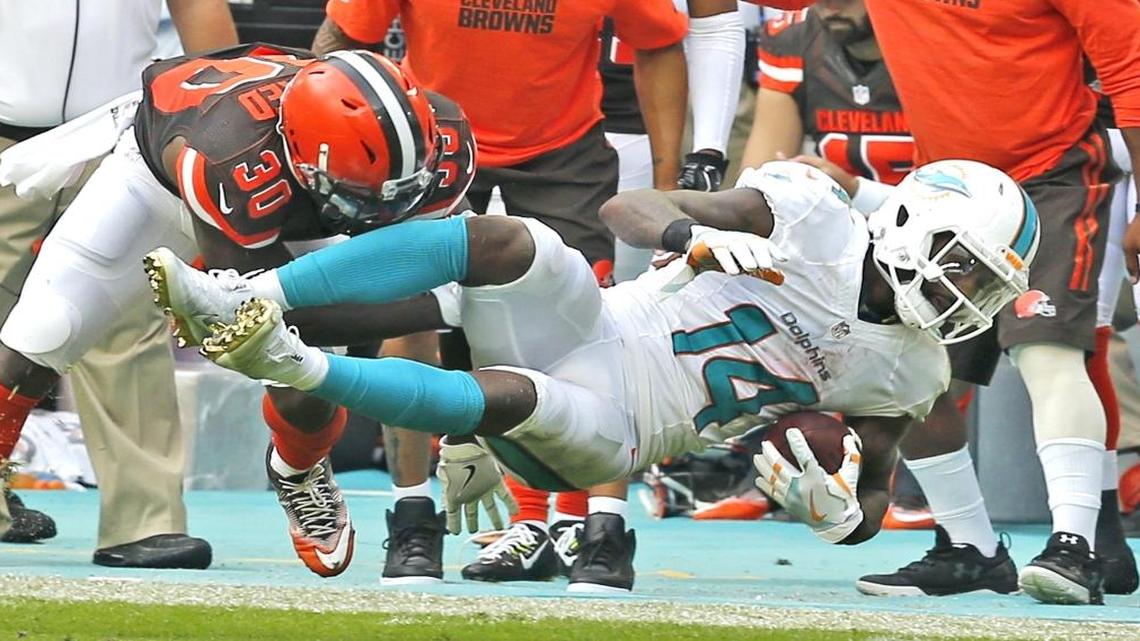 Miami Dolphins Jarvis Landry catches a third quarter pass as Cleveland Browns Derrick Kindred fails to defend at Hard Rock Stadium in Miami Gardens, Florida, Sun., Sept. 25, 2016.
