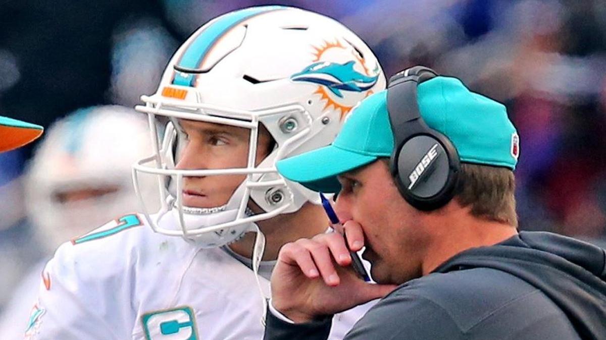 Ryan Tannehill, left, and his coach Adam Gase need to get it figured out — fast.