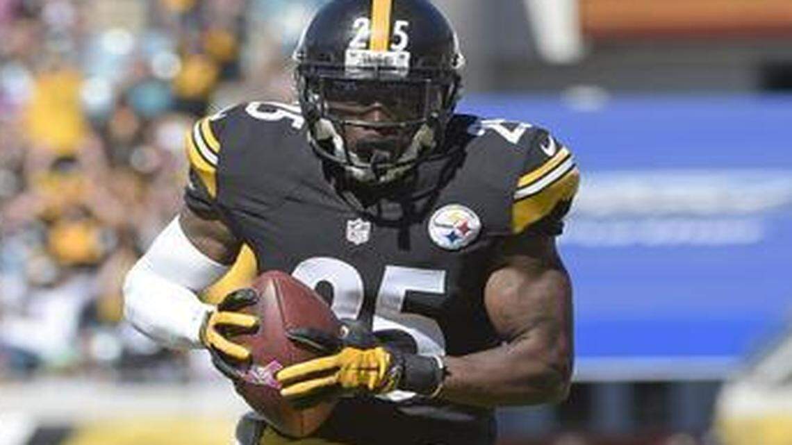 
Pittsburgh Steelers cornerback Brice McCain returns an intercepted pass 22 yards for a touchdown against the Jacksonville Jaguars on Sunday, Oct. 5, 2014. 
