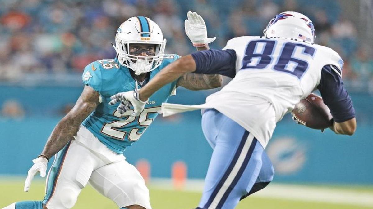 Miami Dolphins cornerback Xavien Howard (25) chases Tennessee Titans wide receiver Andrew Turzilli (86) in the second quarter as the Miami Dolphins host the Tennessee Titans at Hard Rock Stadium on Thurs., Sept. 1, 2016.