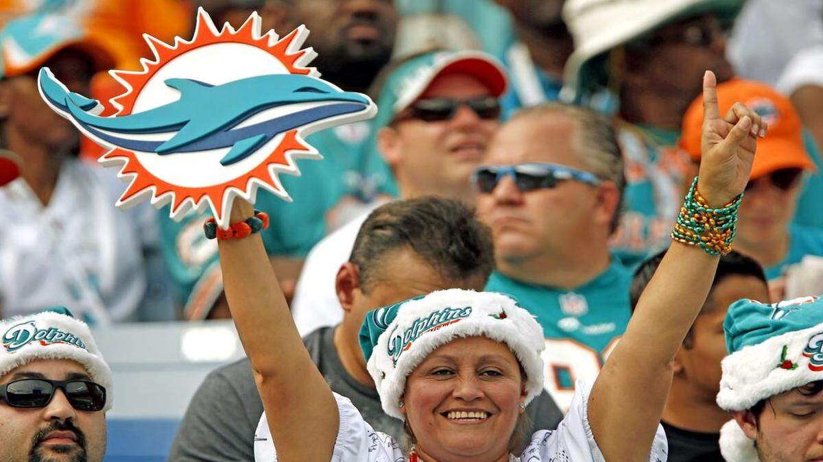 
Miami fans show their support as the Miami Dolphins play host to the Minnesota Vikings at Sun Life Stadium on Sunday, December 21, 2014.
