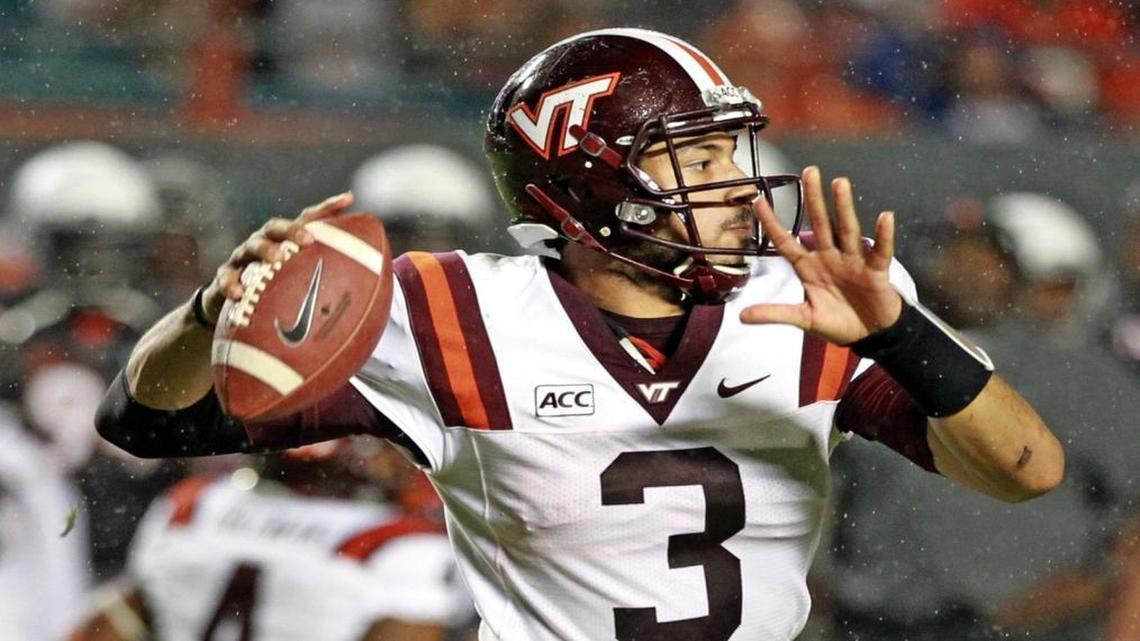
 Logan Thomas is the new Dolphins third-string quarterback. He played college football at Virginia Tech, seen here competing at Sun Life Stadium against UM in 2013.
