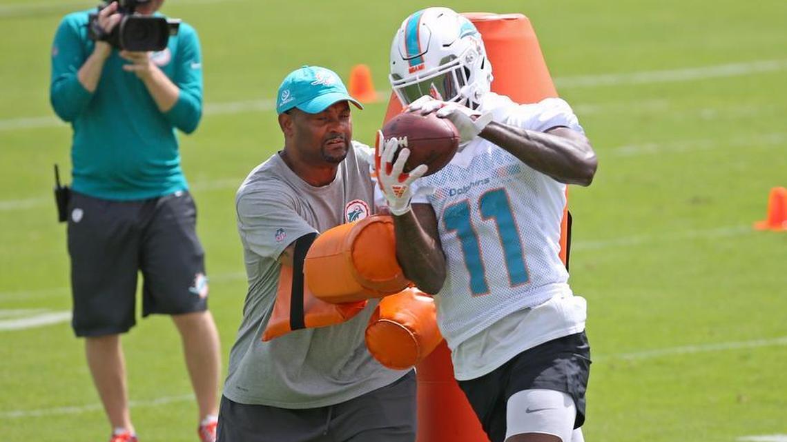 Miami Dolphins wide receiver DeVante Parker #11 catches a pass during the Miami Dolphins Organized Team Activities at the Baptist Health Training Facility at Nova Southeastern University on Wednesday, May 23, 2018 in Davie.  DeVante Parker caught 57 passes for 670 yards but just one touchdown in 2017.