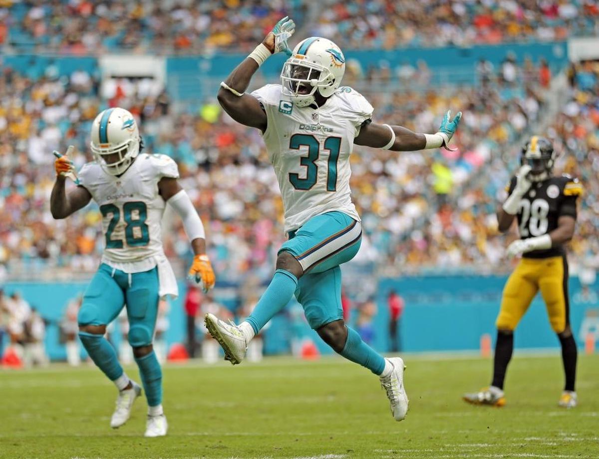 Miami Dolphins free safety Michael Thomas (31) reacts after stopping Pittsburgh Steelers defensive back Justin Gilbert (24) as the Miami Dolphins host the Pittsburgh Steelers at Hard Rock Stadium on Sun., Oct. 16, 2016.