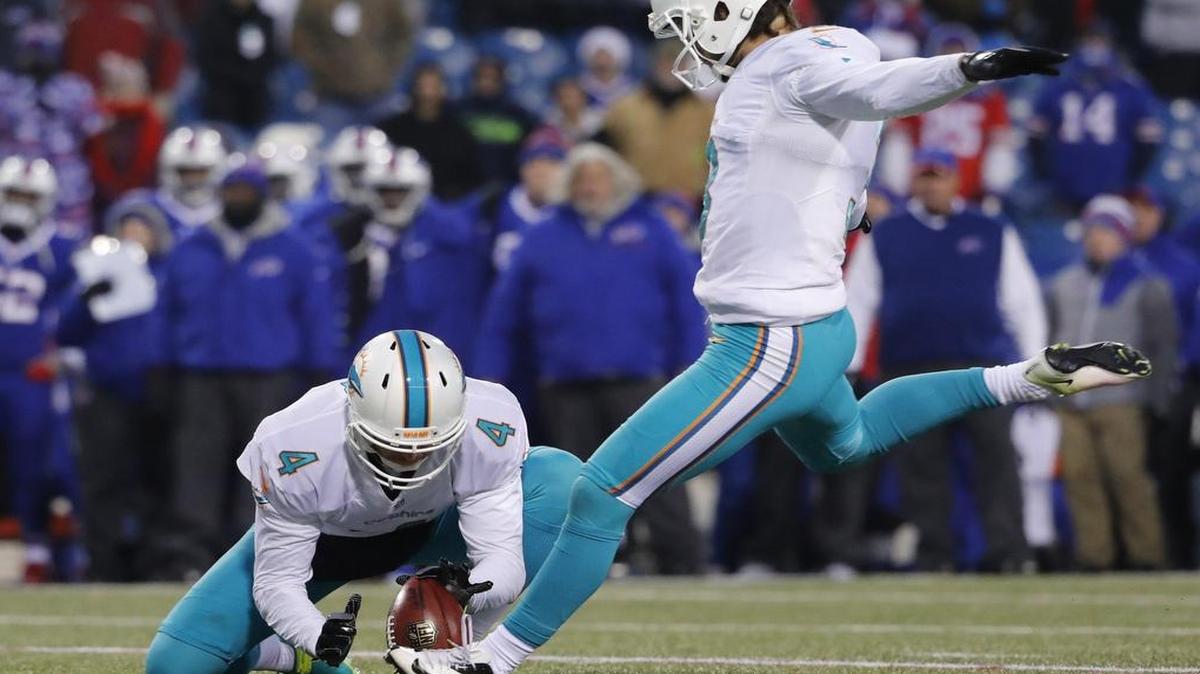 Dolphins kicker Andrew Franks kicks the winning 27-yard field goal in overtime. Franks also connected on a 55-yarder with six seconds left to send the game into overtime.