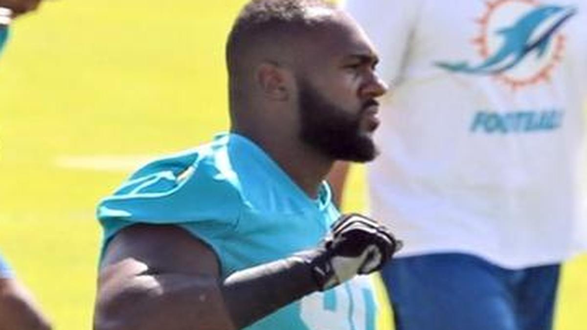 Earl Mitchell, right, is out at least eight weeks with a pesky calf injury.