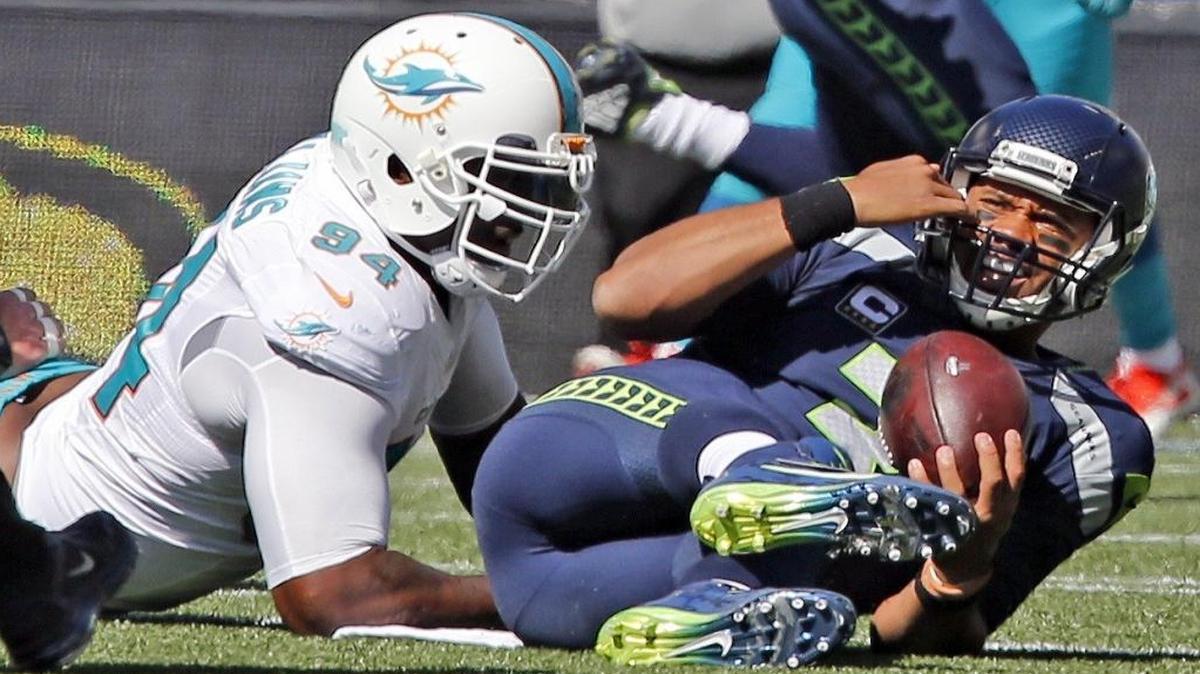 Miami Dolphins defensive end Mario Williams sacks Seattle Seahawks quarterback Russell Wilson in the first quarter at CenturyLink Field in Seattle, on Sept. 11, 2016. Williams was called out by defensive coordinator Vance Joseph for his play in the wake of a disappointing loss to the Tennessee Titans on Sunday, Oct. 9.