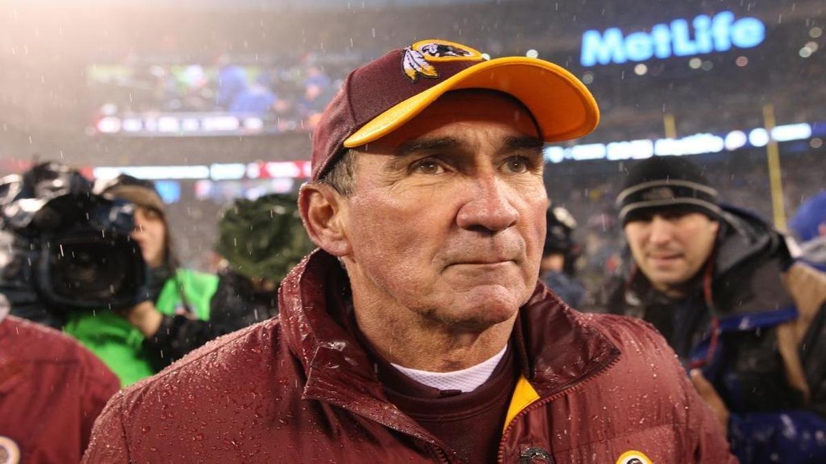 In this Dec. 29, 2013 file photo, Washington Redskins head coach Mike Shanahan leaves the field after an NFL football game against the New York Giants in East Rutherford, N.J.