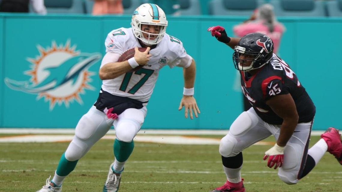 Miami Dolphins quarterback Ryan Tannehill runs the ball against the Houston Texans on Sunday, Oct. 25, 2015, in Miami.