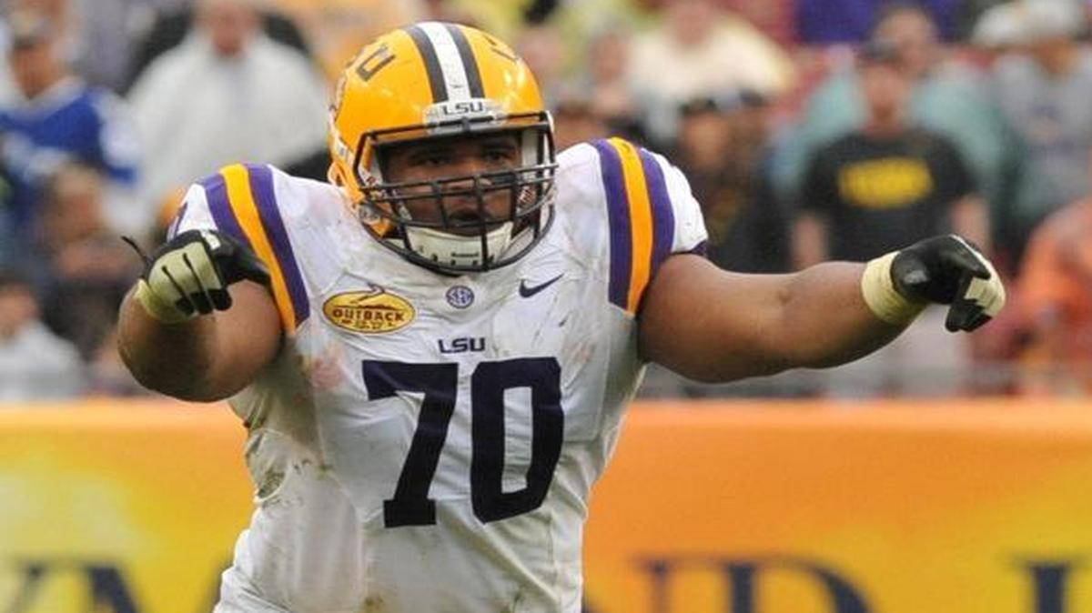 
 Tackle Lael Collins #70 of the LSU Tigers sets for play against the Iowa Hawkeyes January 1, 2014 in the Outback Bowl at Raymond James Stadium in Tampa, Florida. 
