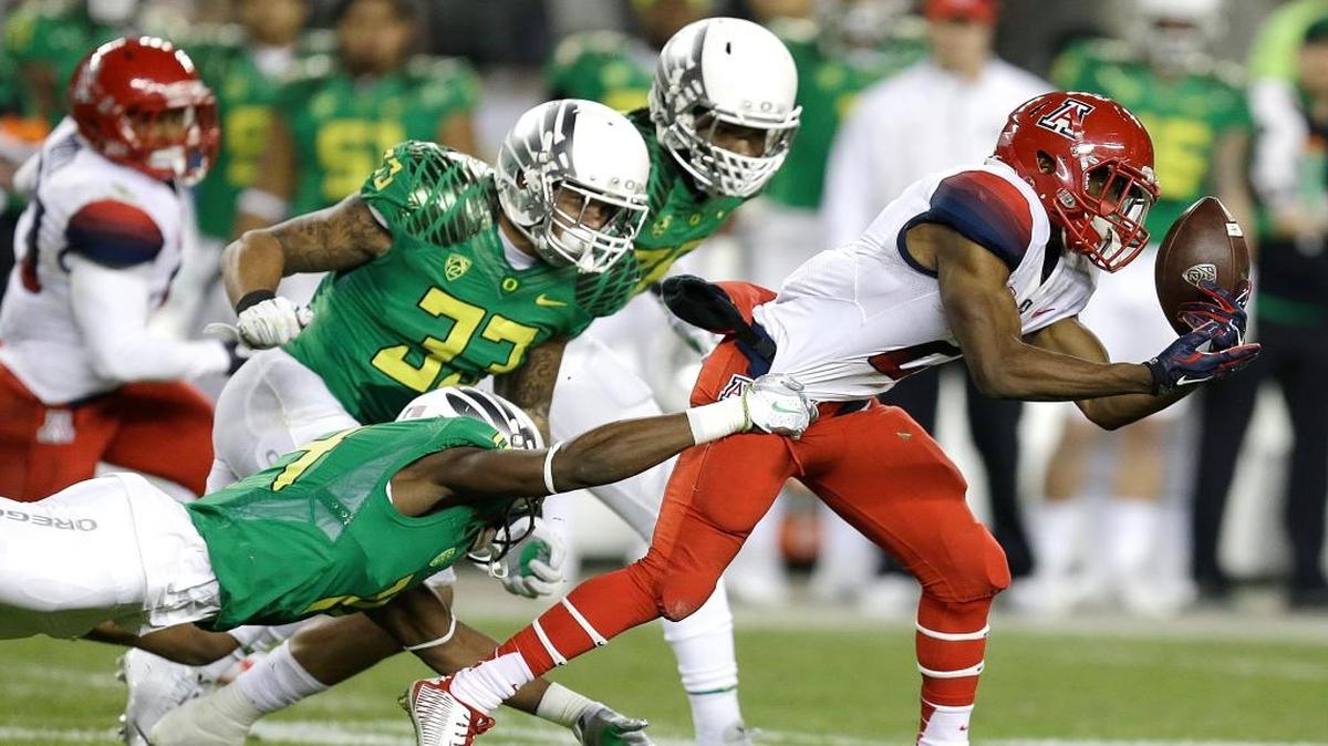The Dolphins claimed Ifo Ekpre-Olomu, shown making a tackle in college, off waivers Tuesday.