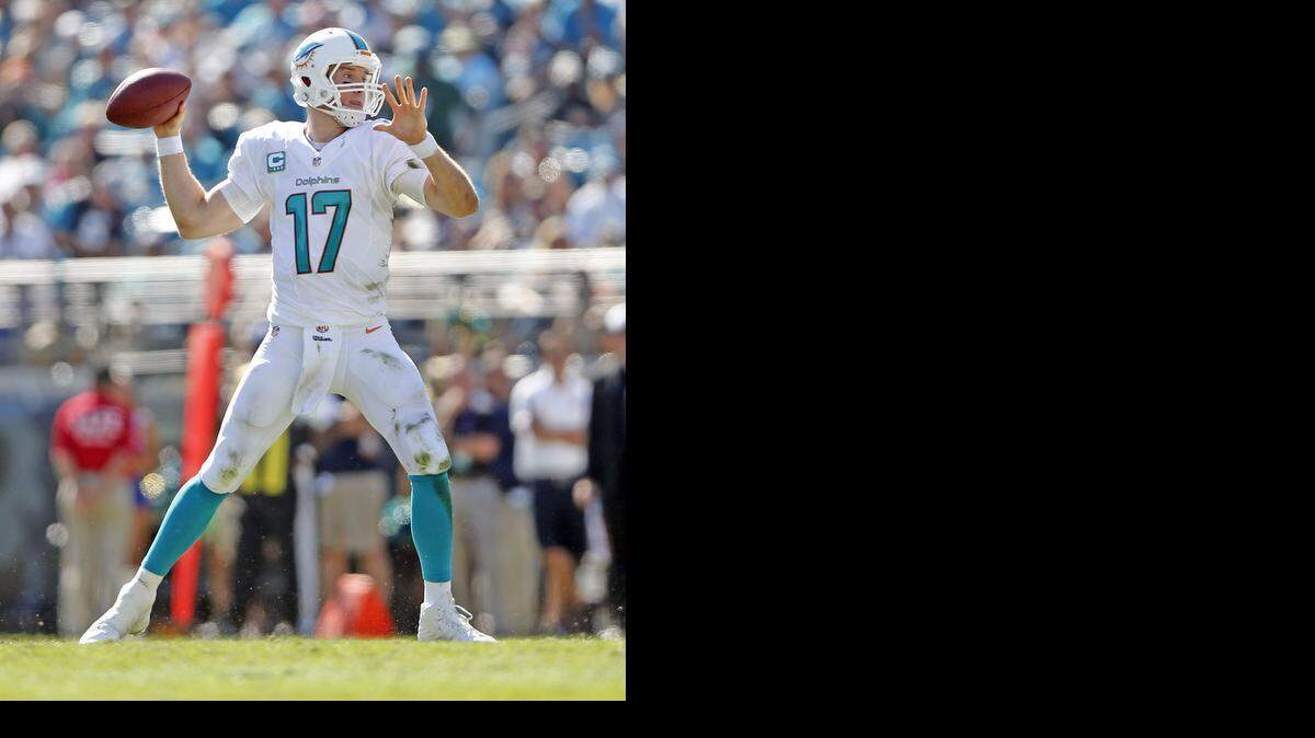 
Miami Dolphins quarterback Ryan Tannehill (17) sets up to pass in the second quarter against the Jacksonville Jaguars at Everbank Field in Jacksonville on Sunday, Oct. 26, 2014.
