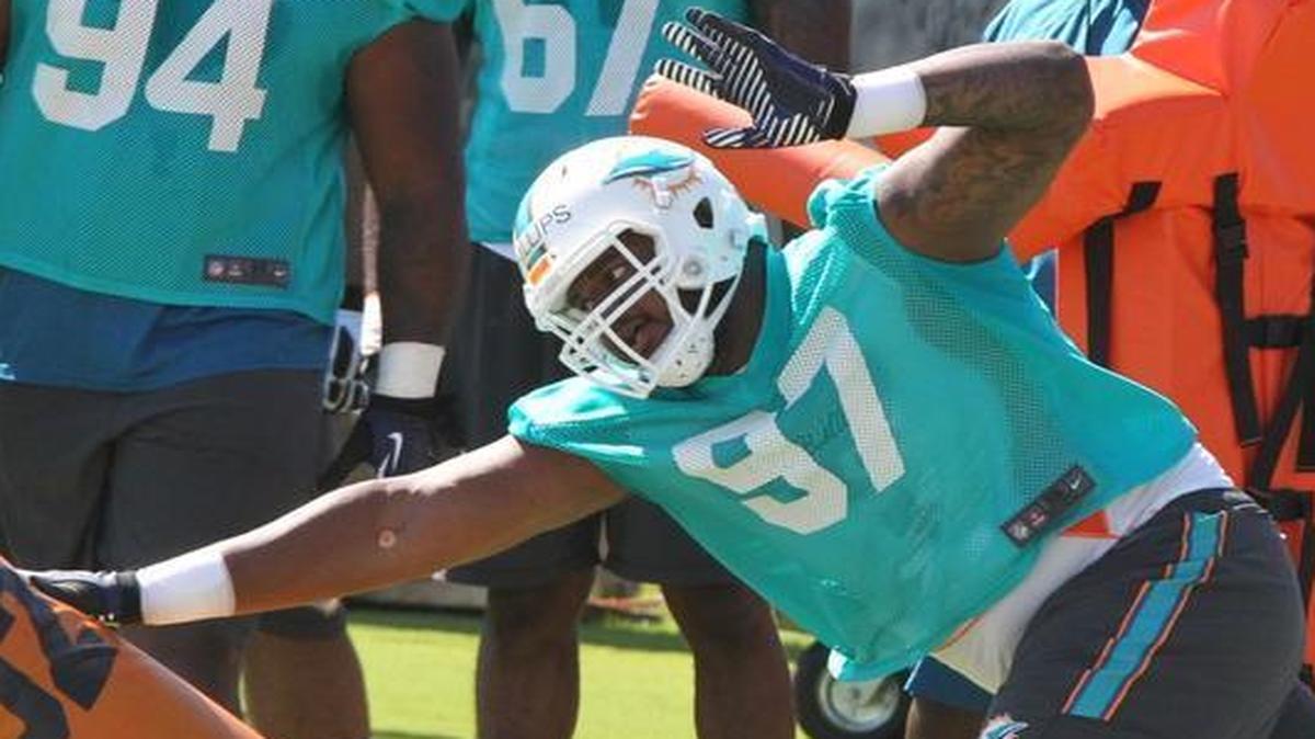 
Miami Dolphins second-round pick Jordan Phillips works through drills during rookie minicamp Friday, May 8, 2015 in Davie. 

