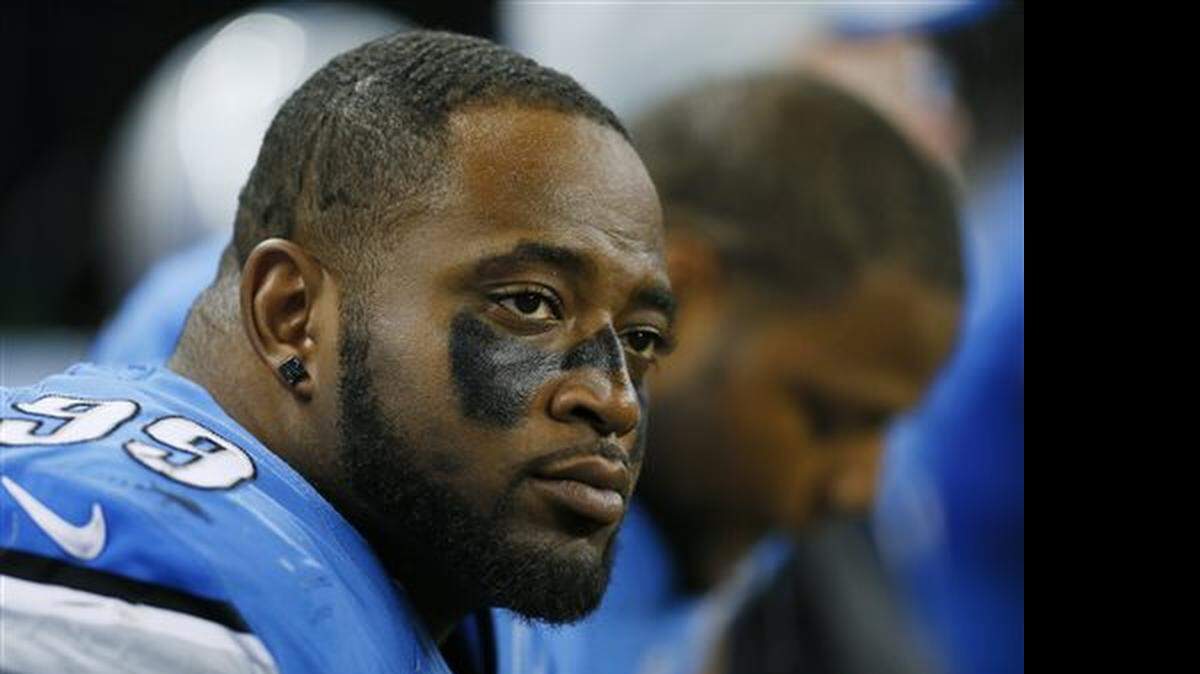
Detroit Lions defensive tackle C.J. Mosley sits on the bench during the second half against the New Orleans Saints in Detroit on Oct. 19, 2014. 
