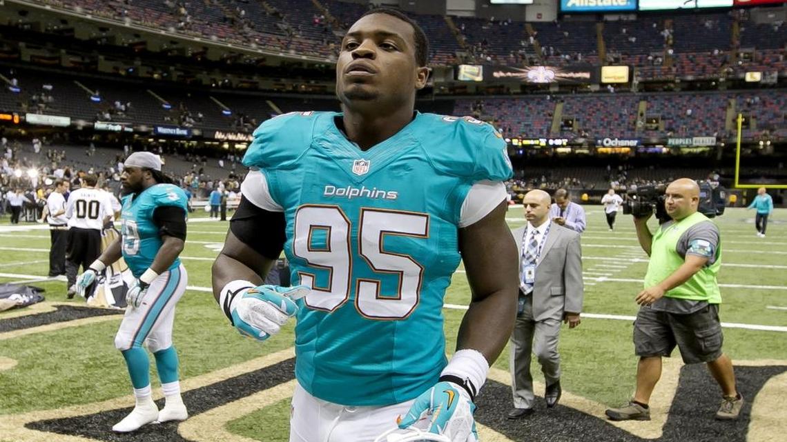 Defensive end Dion Jordan runs off the field after the Dolphins’ game against the Saints in September 2013.