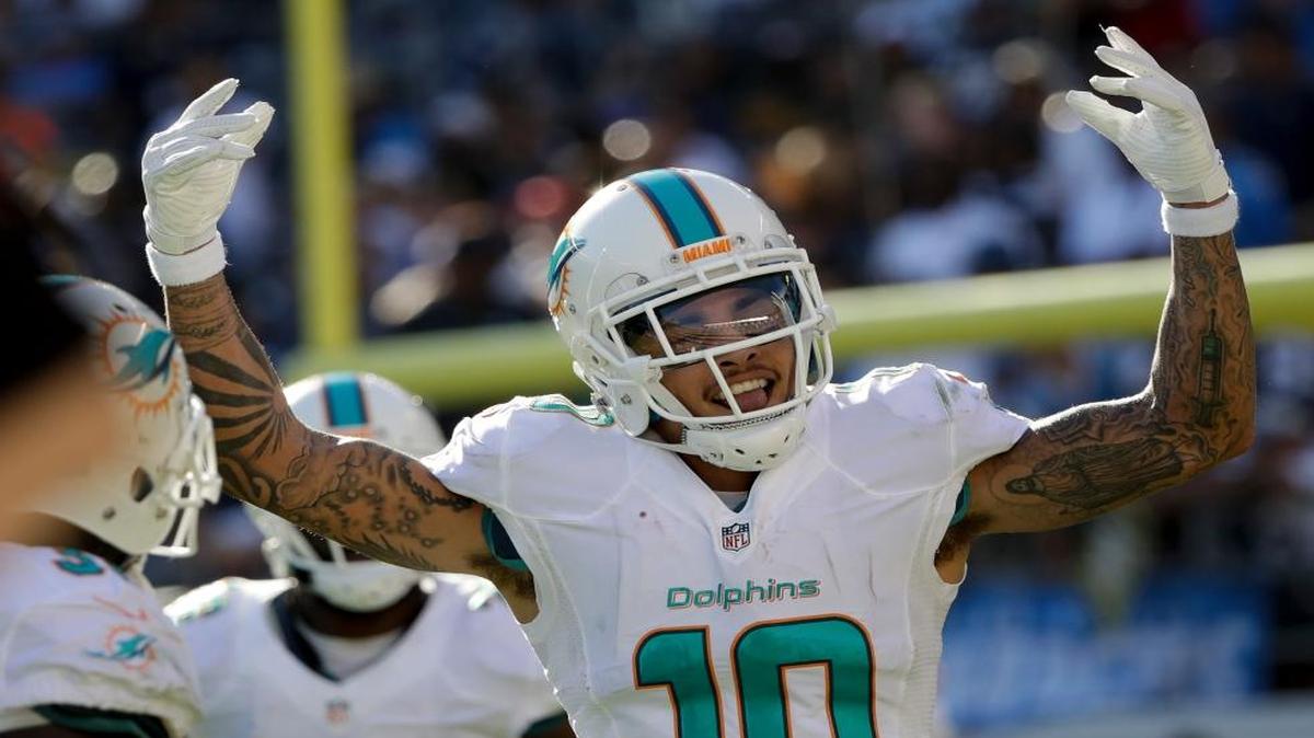 Miami Dolphins wide receiver Kenny Stills celebrates after scoring against the San Diego Chargers during the first half of an NFL football game in San Diego on Nov. 13, 2016.