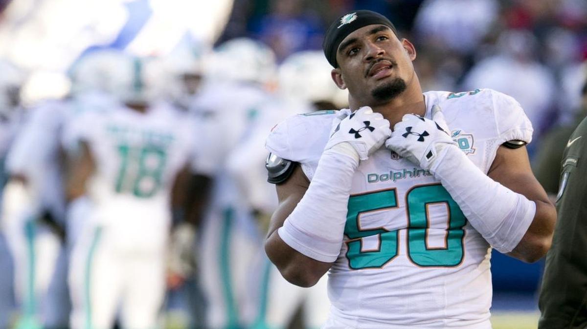 Miami Dolphins defensive end Olivier Vernon, shown in the Dolphins’ loss to the Bills on Sunday, November 8, 2015, stands to make $15.7 million in 2016 if the Dolphins franchise him.