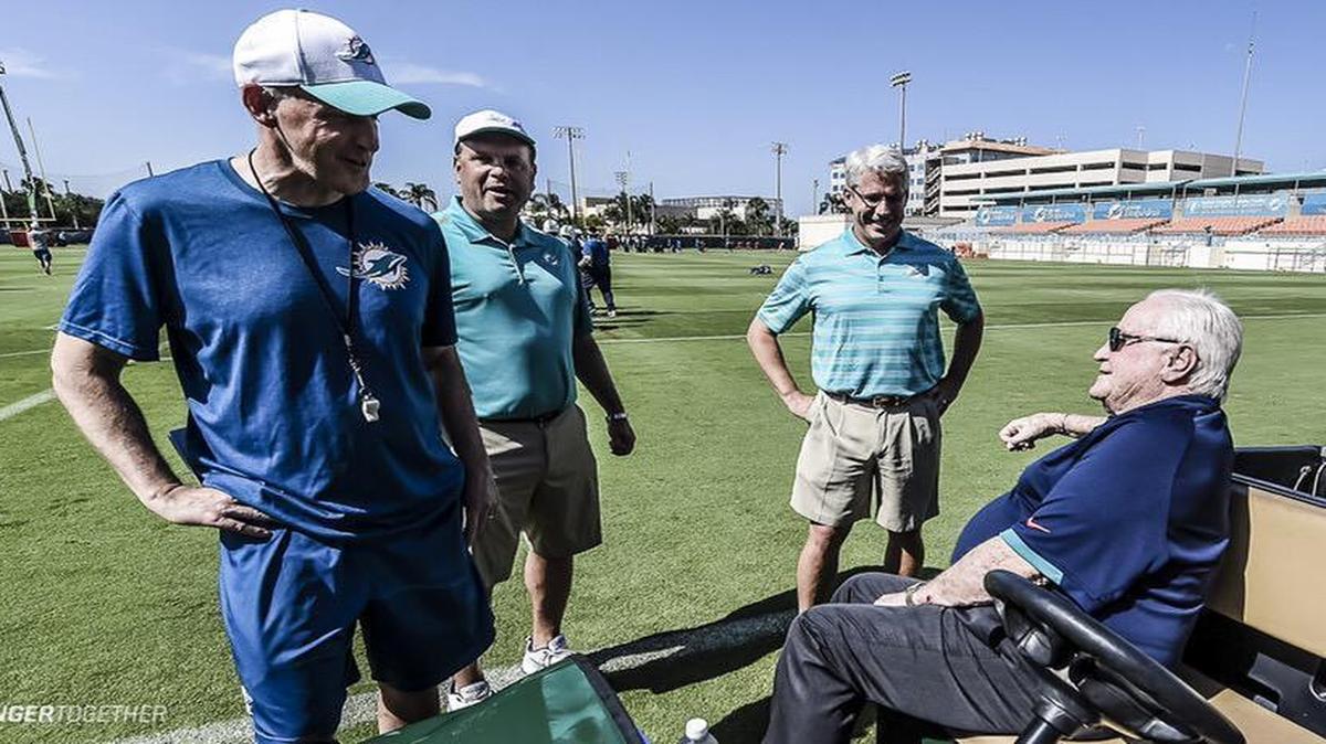 
Former Dolphins coach Don Shula, right, talks to current coach Joe Philbin at rookie camp Saturday.
